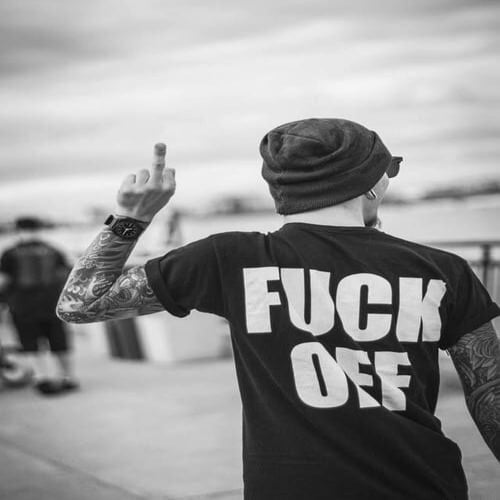 boy showing middle finger 