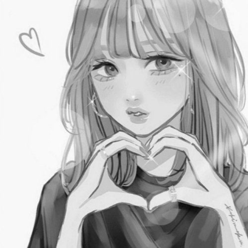 girl making hand heart